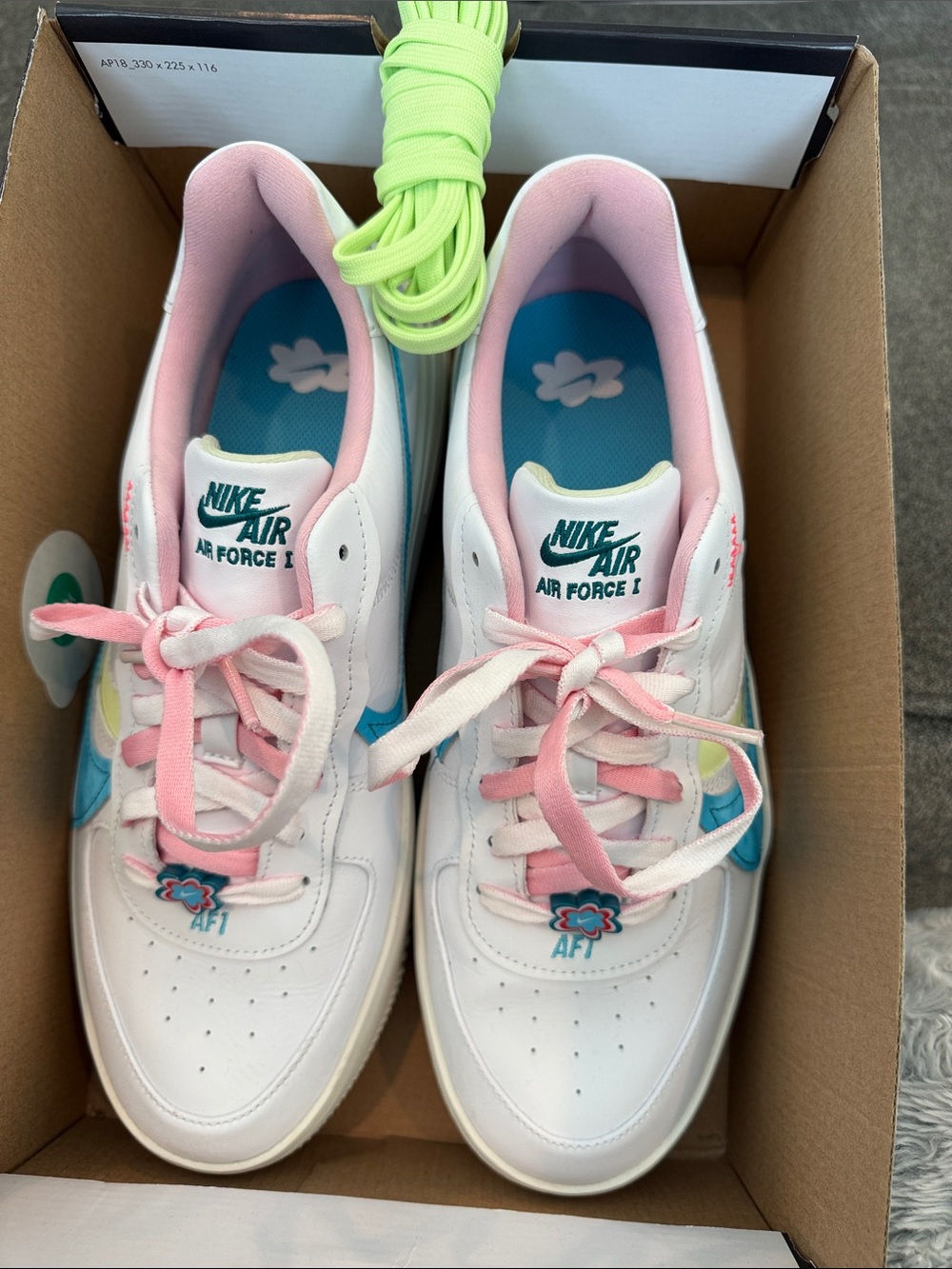 Nike Kids Sneakers in White with Pink, Blue & Green Accents